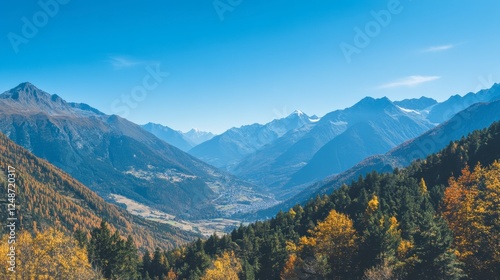 A panoramic view of the Italian Alps with rugged peaks and valleys, showcasing the natural beauty of the region.