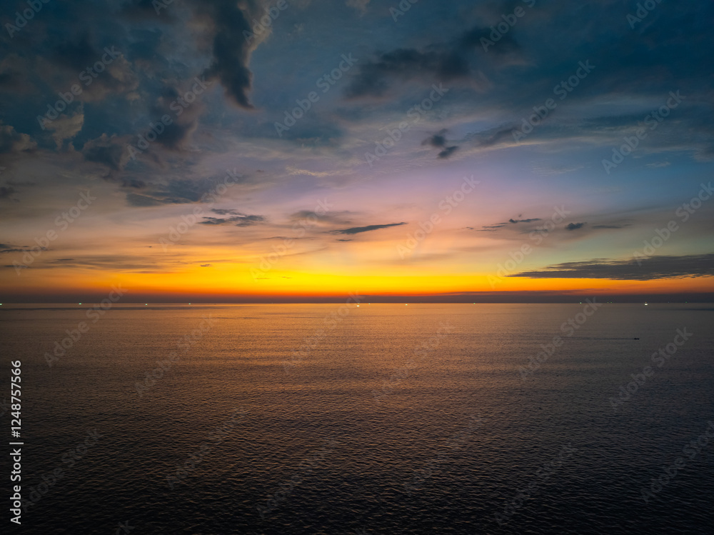 Obraz premium Aerial view sunset or sunrise sky,Nature beautiful Light Sunset over sea, Colorful scenery Sky with Amazing clouds and waves in sunset sky nature light cloud background