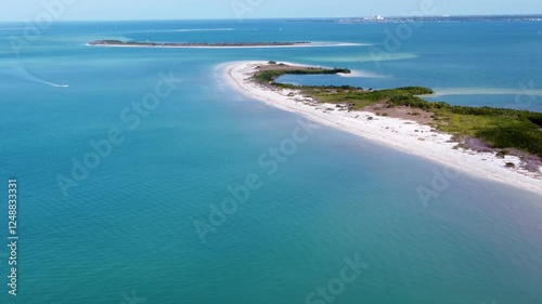 Honeymoon Island State Park, Florida. Aerial view of turquoise waters, white sand beaches, and lush nature. Perfect for a tropical getaway on the Gulf of Mexico. photo