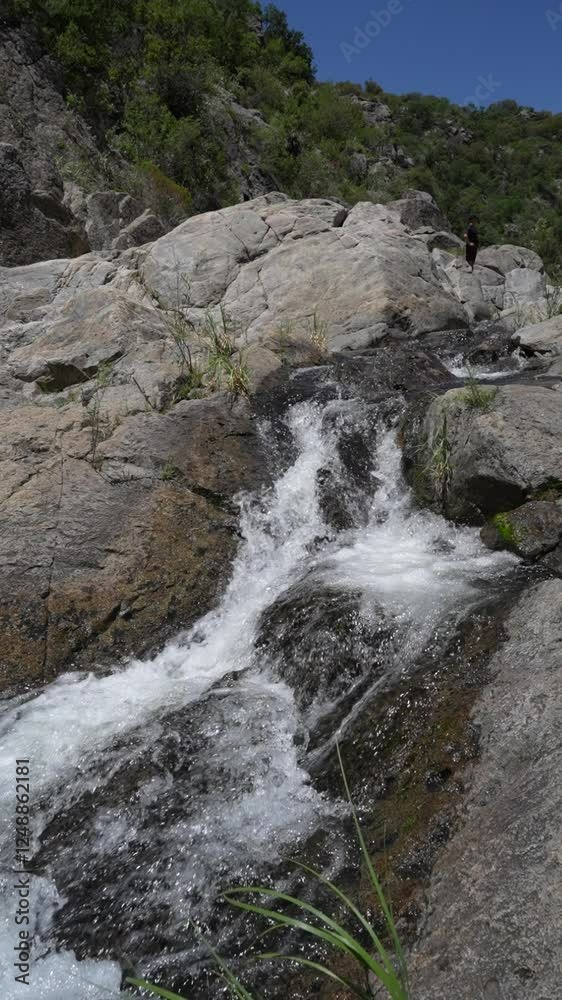 Majestic waterfalls cascading over rugged rocks in the serene Cordoba mountains, Argentina, captured in stunning slow motion to showcase the beauty of nature, peace, and harmony in high-definition Majestic waterfalls cascading over rugged rocks in the serene Cordoba mountains, Argentina, captured in stunning slow motion to showcase the beauty of nature, peace, and harmony in high-definition