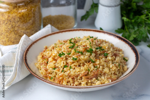 Bilde på lerret Traditional delicious Turkish food; Bulgur pilaf with vermicelli (Turkish name;