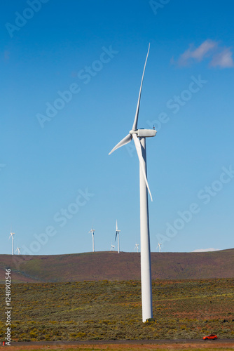 Wallpaper Mural Wind turbines on the rolling hills of Kittikas county in Washington state, tall white towers with blades for energy generation. Torontodigital.ca