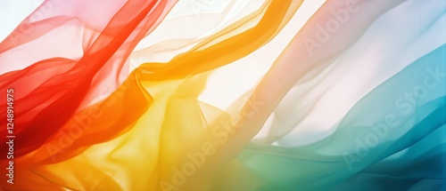 Vibrant sheer fabrics in rainbow hues dance gracefully, intertwining light and movement.