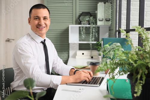 Handsome businessman workin...