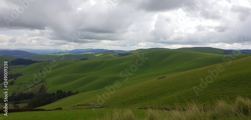 Rolling Green Hills Under Dramatic Sky
