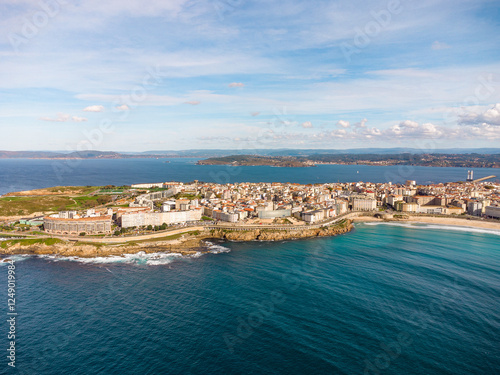 A Coruna city, aerial perspective. Old historic center of the city.  Panoramic aerial view of all Region. Famous travel destination in Galicia, northwest of Spain. Promenade and beach area of the city