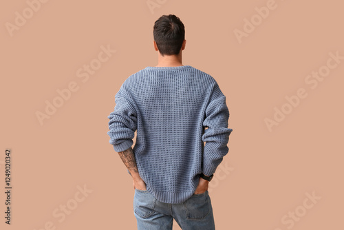 Young man in stylish blue s...