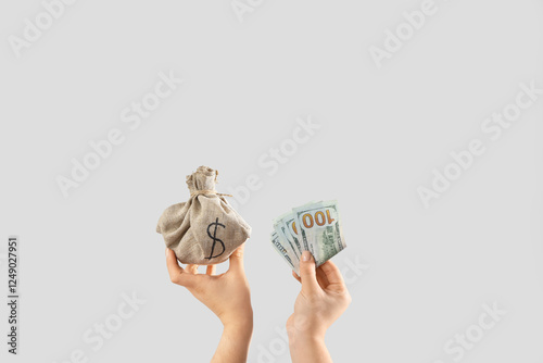 Woman holding bag with mone...