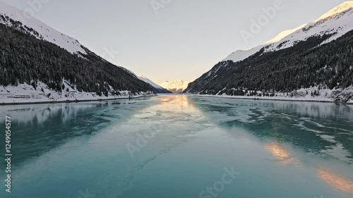 Aerial view of the Gepatsch reservoir on the Kaunertal Glacier Road in winter.