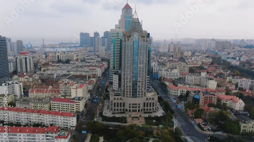 Explore the iconic China Customs Building in Qingdao, Shandong Province, showcasing city architecture and skyline views