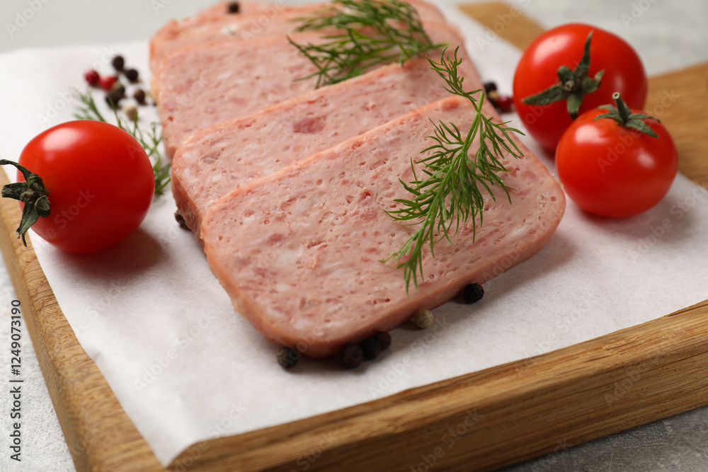 Pieces of tasty canned meat, dill, peppercorns and tomatoes on grey table, closeup Pieces of tasty canned meat, dill, peppercorns and tomatoes on grey table, closeup