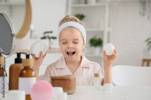 Cute little happy girl in p...