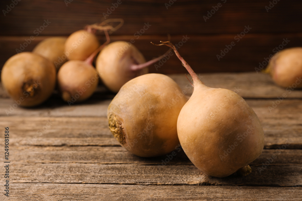 Whole fresh turnips on wooden table, closeup Whole fresh turnips on wooden table, closeup