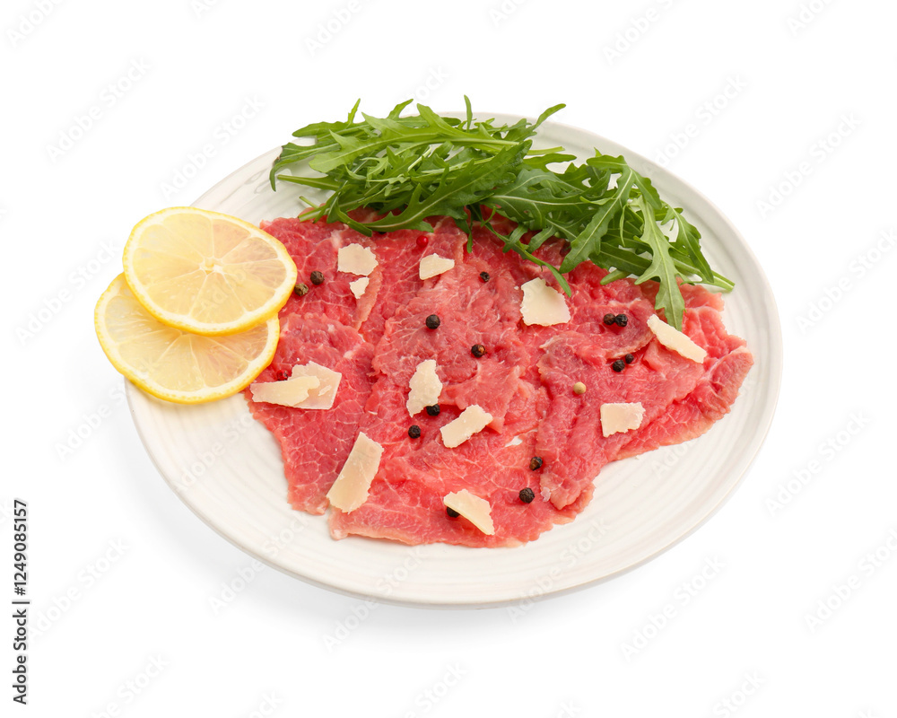 Fresh beef carpaccio with arugula, lemon and cheese isolated on white Fresh beef carpaccio with arugula, lemon and cheese isolated on white