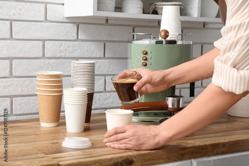 Barista pouring freshly bre...