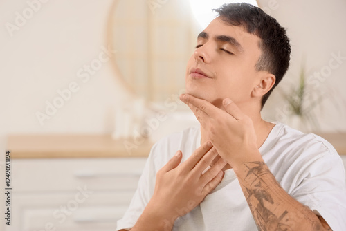 Young man doing face buildi...