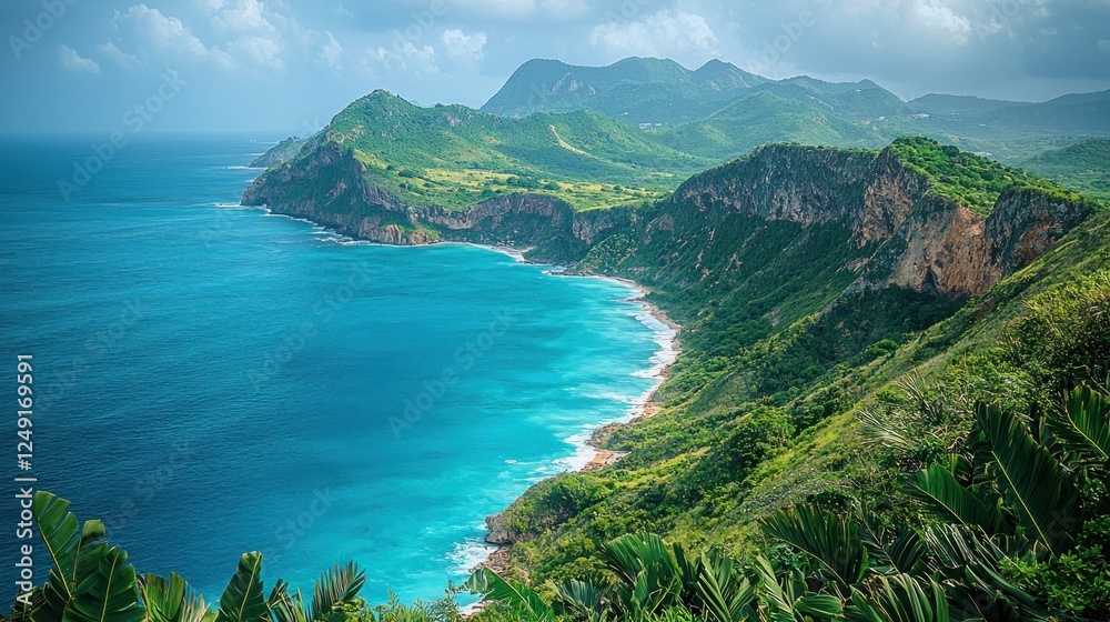 Naklejka premium Scenic coastal view showcasing lush green hills and vibrant blue waters
