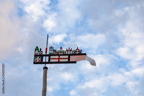 national symbol in the form of a flag against the background of a beautiful blue sky