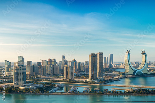 Lusail, Qatar - December 20, 2024: Katara buildings view from Lusail Marina Park. Crescent Tower  photo