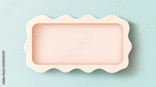 A soft pastel-colored nameplate with wavy edges placed on a light blue background creating a modern and elegant minimalist design
