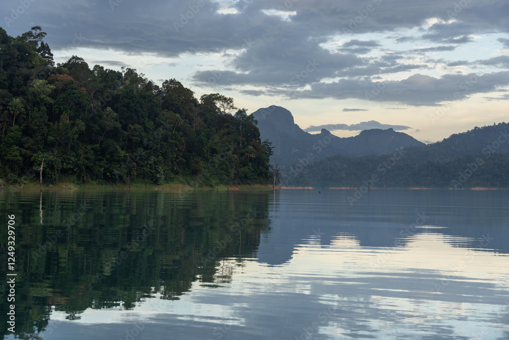 Khao Sok, Thailand: Point of view of a long tail boat riding the stunning Khao Sok dam lake in southern Thailand in early morning