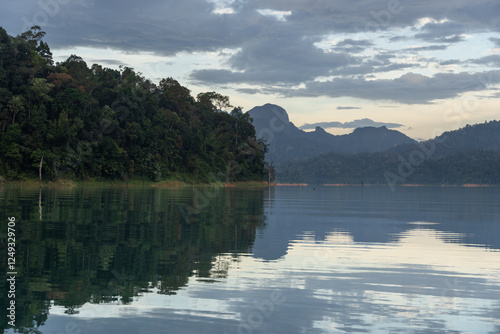 Obraz na płótnie Khao Sok, Thailand: Point of view of a long tail boat riding the stunning Khao Sok dam lake in southern Thailand in early morning w salonie