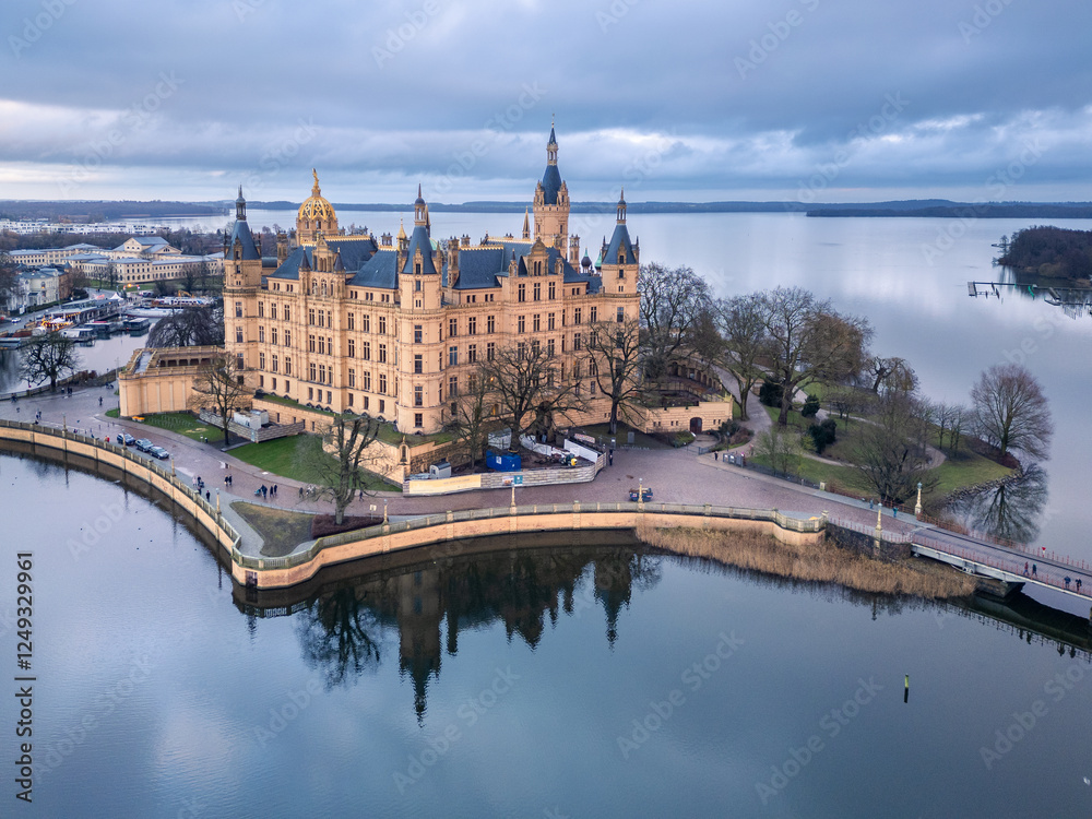 Schwerin, Germany: Aerial view of the famous Schwerin castle and reflection in northern Germany on a cloudy winter day