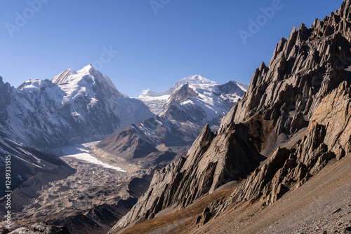 Obraz na płótnie Manaslu Circuit, Nepal: Landscape of the Chinese Tibet border, the Rui La pass, near Samdo in the Himalayas in Nepal with the Panbari Himal in the background w salonie