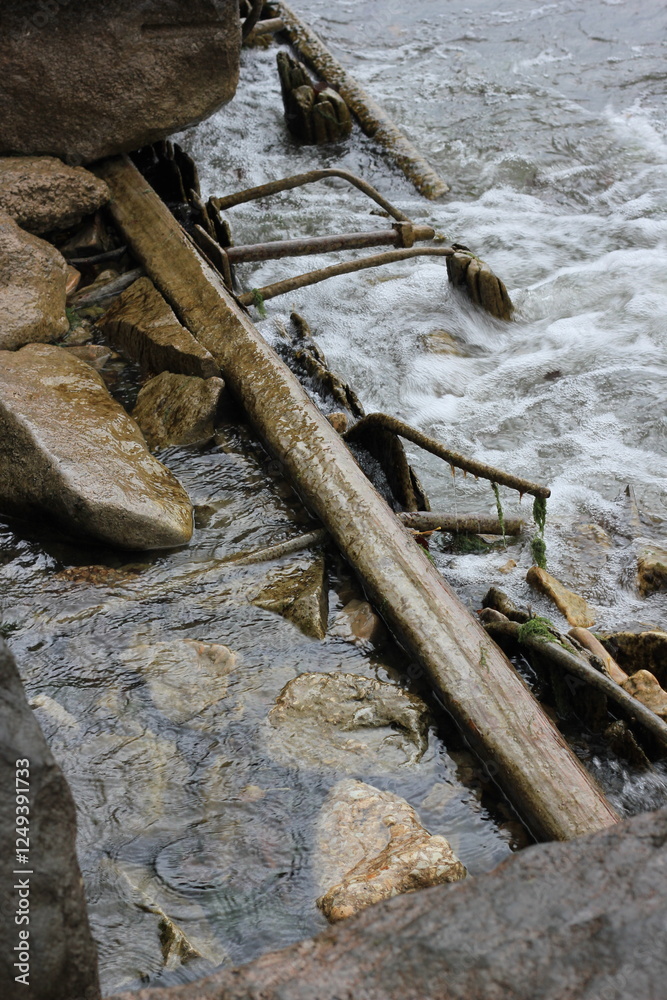 rocks and construction debris in the river rocks and construction debris in the river