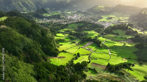 Breathtaking aerial views of the lush green landscapes of Azores islands during golden hour. Spring nature of San Miguel island, Azores, Portugal