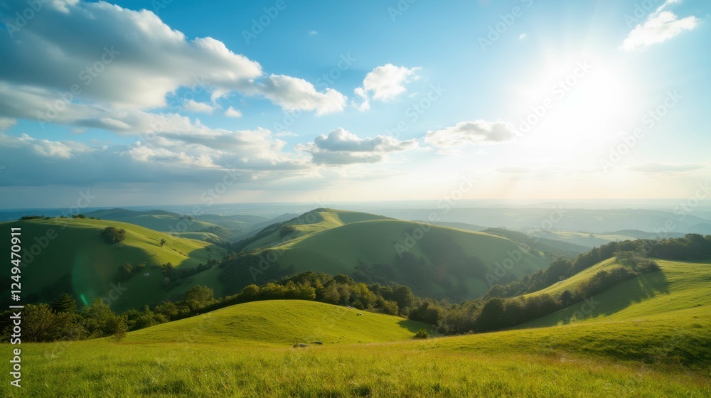 Naklejka premium Serene Landscape of Rolling Green Hills Under Blue Sky and Sunlight