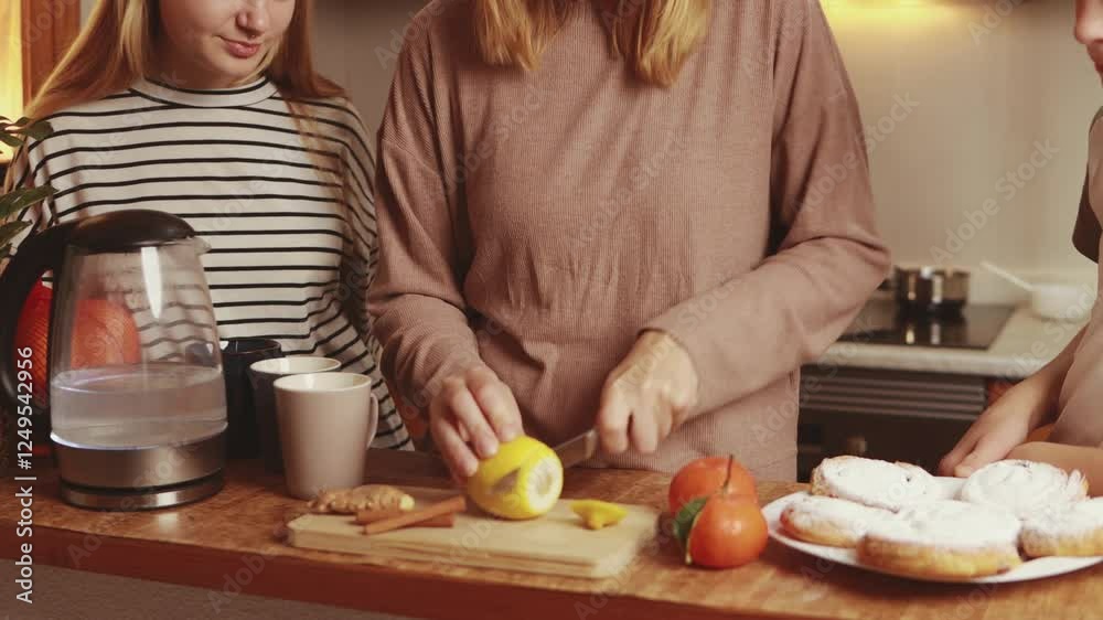 Sunlight-filled kitchen scene: mother cutting lemon, kids assisting with tea preparation, ginger nearby, homemade pastries spreading warmth of shared family experience
