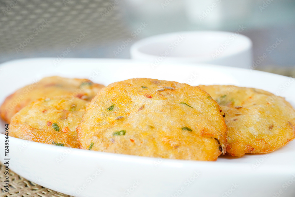 Aloo ki kachori, potato stuffed kachori with ketchup. Famous indian food Aloo ki kachori, potato stuffed kachori with ketchup. Famous indian food