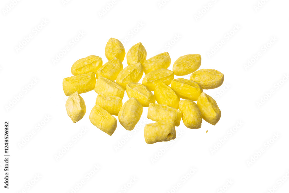 Fototapeta premium Famous traditional Turkish yellow Mevlana candy (in Turkish: Mevlana Şekeri ) isolated on a white background. The local confectionery product in Konya, Turkiye. Close up shot