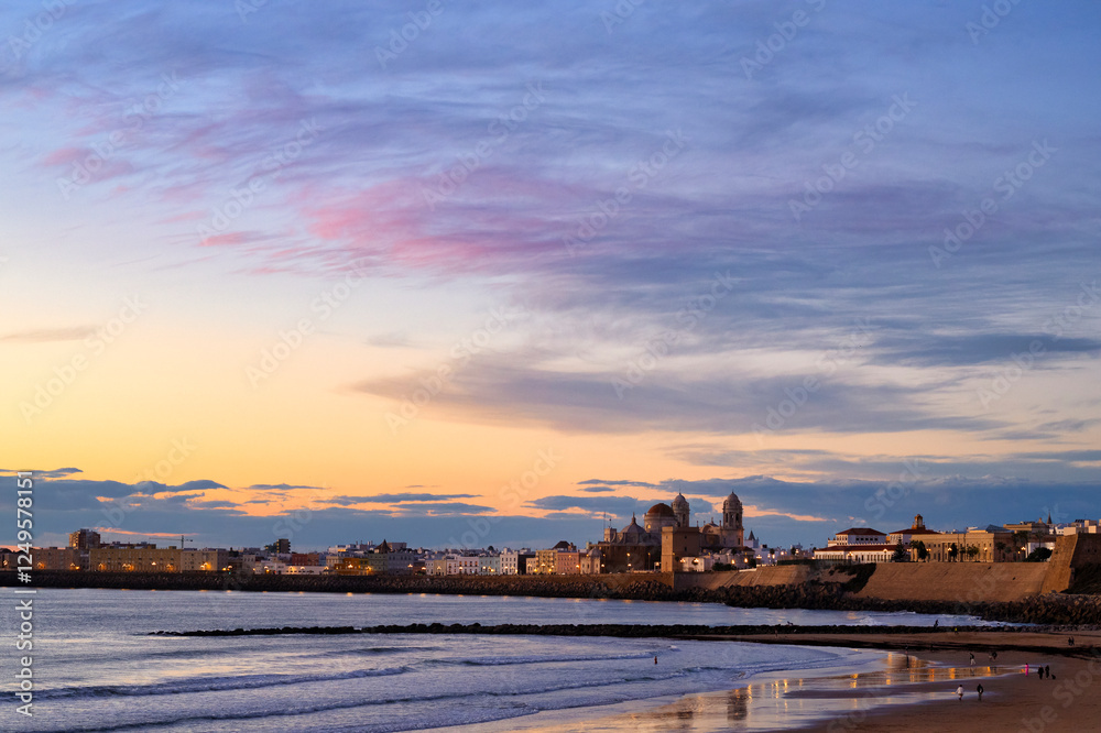 The sea front of the ancient city of Cadiz, located in Andalusia, Spain, on the Atlantic ocean, at sunset The sea front of the ancient city of Cadiz, located in Andalusia, Spain, on the Atlantic ocean, at sunset