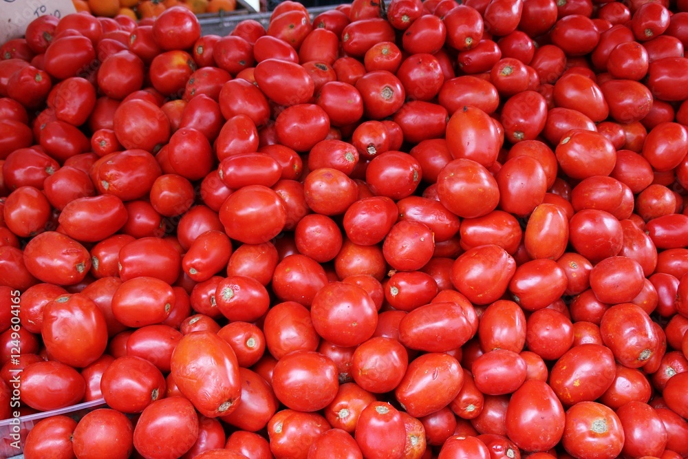 red tomatoes, cut tomatoes, vegetables arranged on a stall, fleshy tomatoes red tomatoes, cut tomatoes, vegetables arranged on a stall, fleshy tomatoes