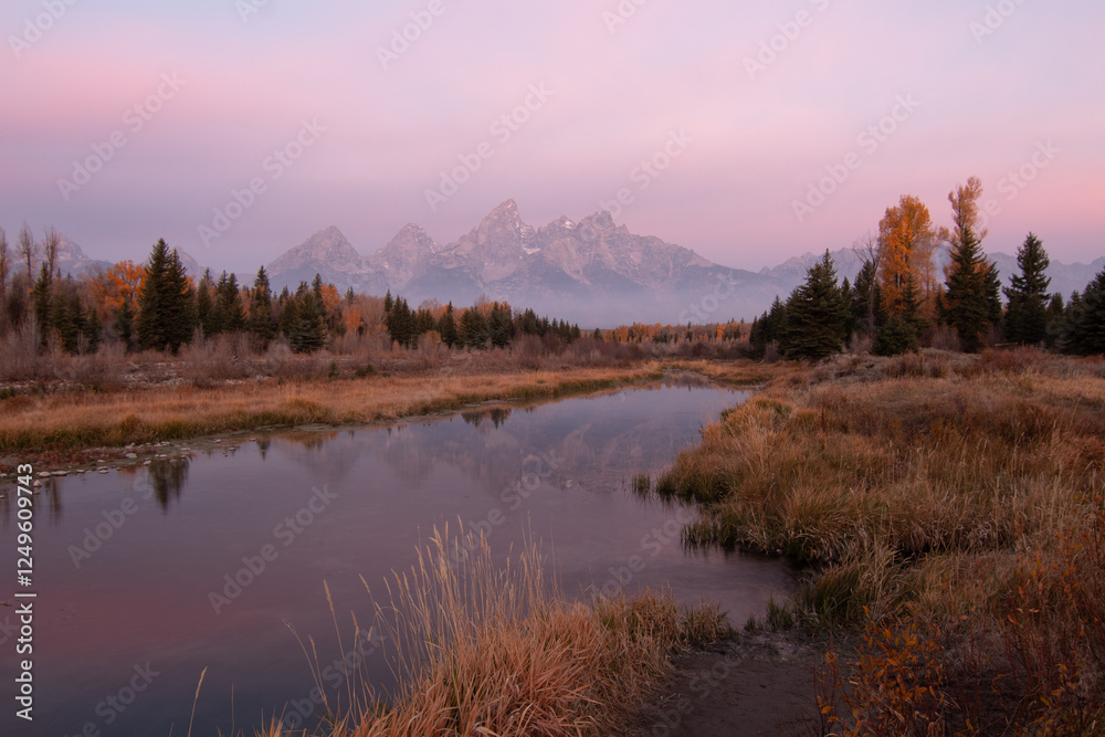 Serene Mountain Landscape with Mirror-Like Reflection of Peaks at Sunrise
Serene Mountain Landscape with Mirror-Like Reflection of Peaks at Sunrise
