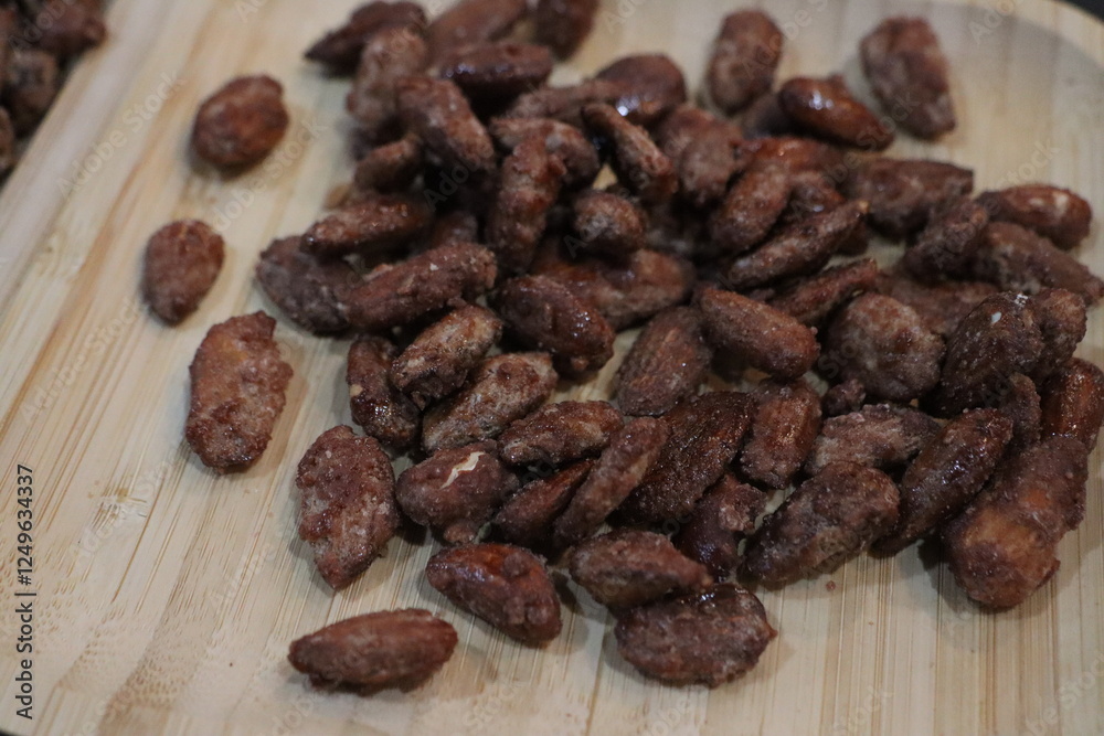 Deliciously Roasted Almonds Nestled Beautifully on a Rustic Wooden Board Await You Deliciously Roasted Almonds Nestled Beautifully on a Rustic Wooden Board Await You