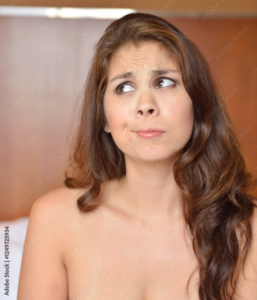 Young multi-racial/biracial woman looking confused or in thought - expression series Young multi-racial/biracial woman looking confused or in thought - expression series