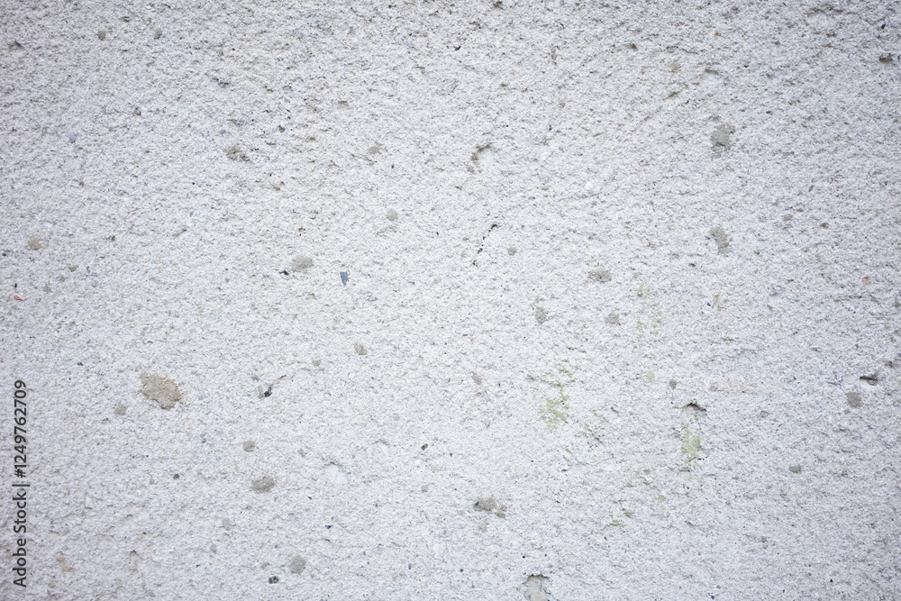 Plain textured wall showcasing light and subtle imperfections in detail Plain textured wall showcasing light and subtle imperfections in detail