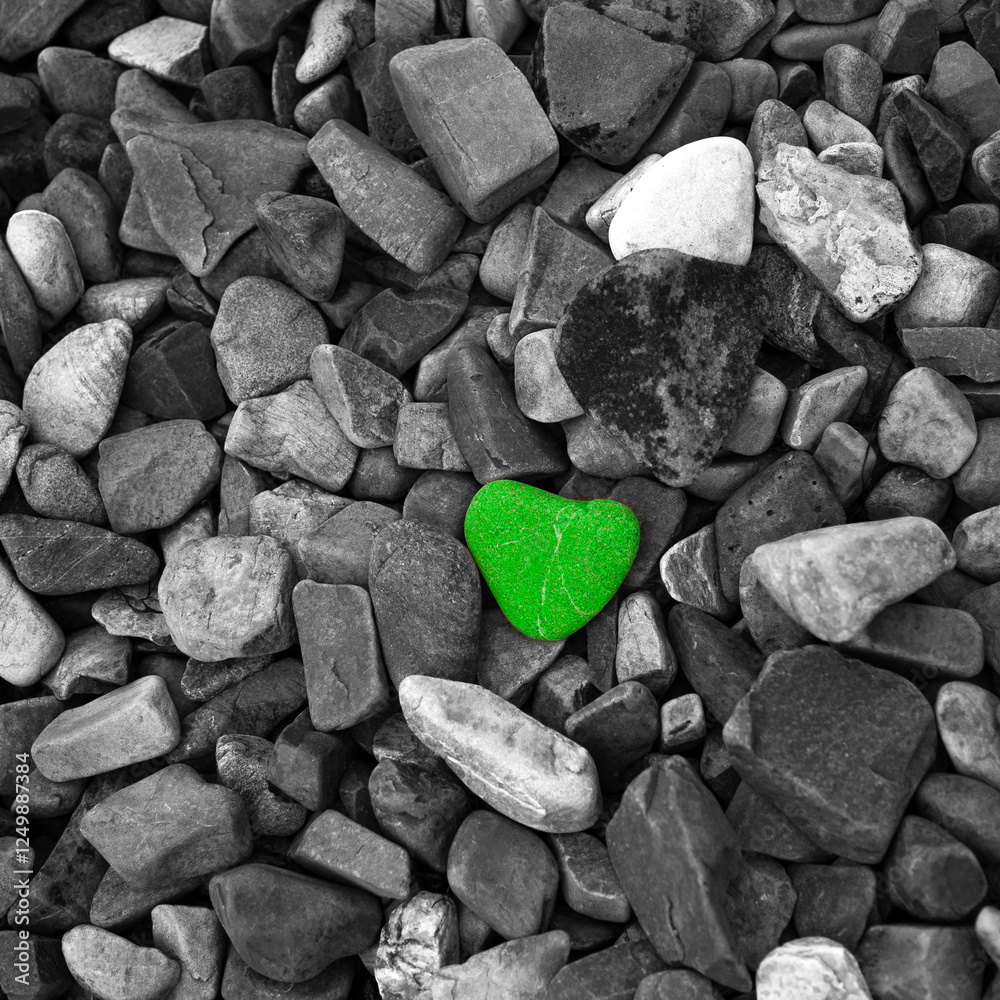 Stone in the shape of a heart, valentine's day background green