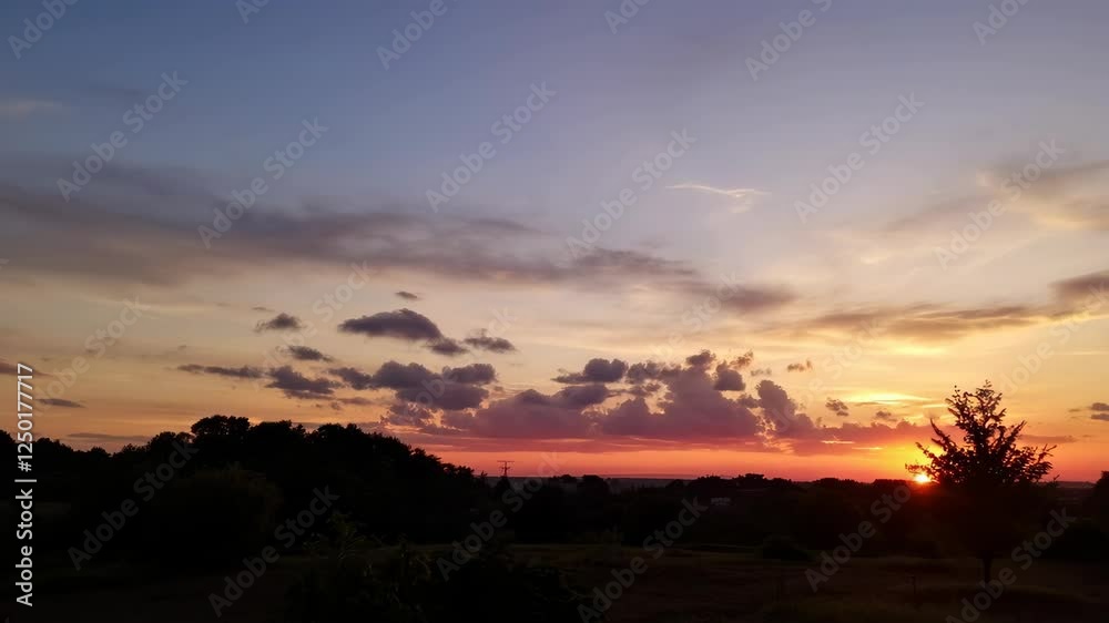 Warm Summer Sunset Sky with Peaceful Horizon and Soft Light Warm Summer Sunset Sky with Peaceful Horizon and Soft Light