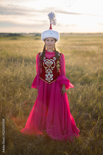 Kazakh woman and man in national costumes photo