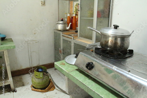 dirty house. old kitchen stove. Dirt kitchenware.