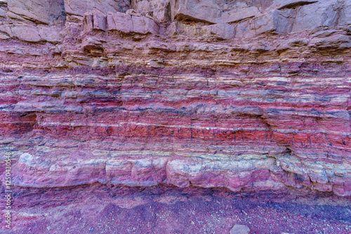 Layered rock formation in Timna desert park photo