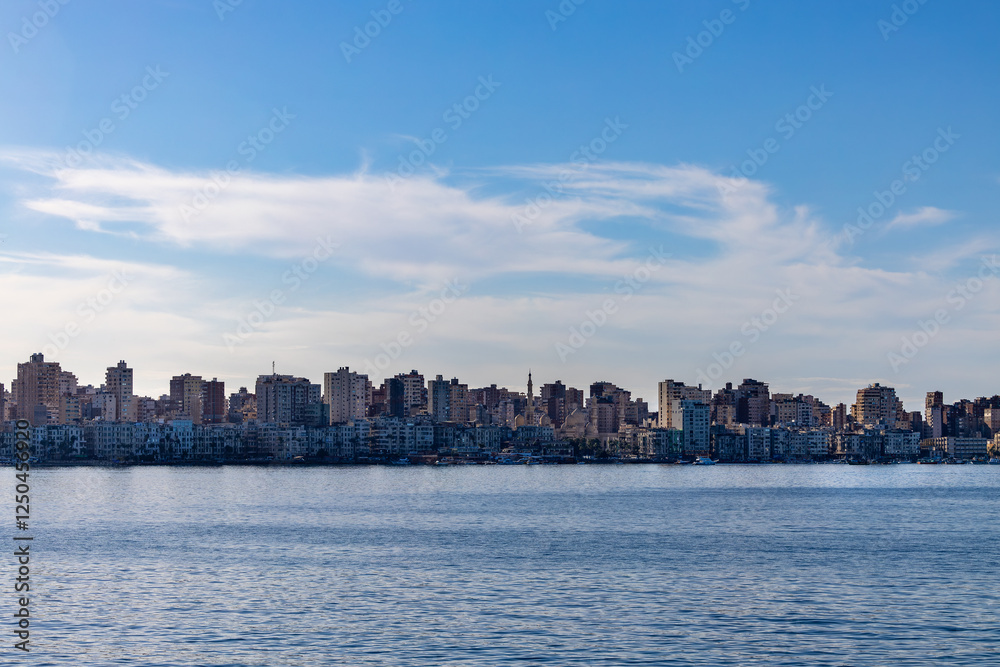 Fototapeta premium Alexandria, Egypt A view of the corniche and city skyline along the Mediterranean.