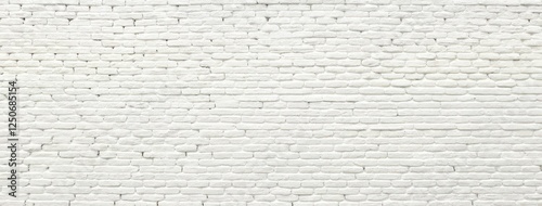 White brick wall with masonry pattern of painted stone and concrete.