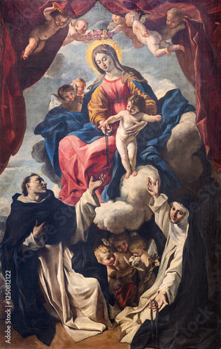 PERUGIA, ITALY - MAY 15, 2024: The painting of Madonna with the St. Dominic and Catherine of Siena in Basilica di San Domenico by Giovanni Lanfranco (1582 - 1647).