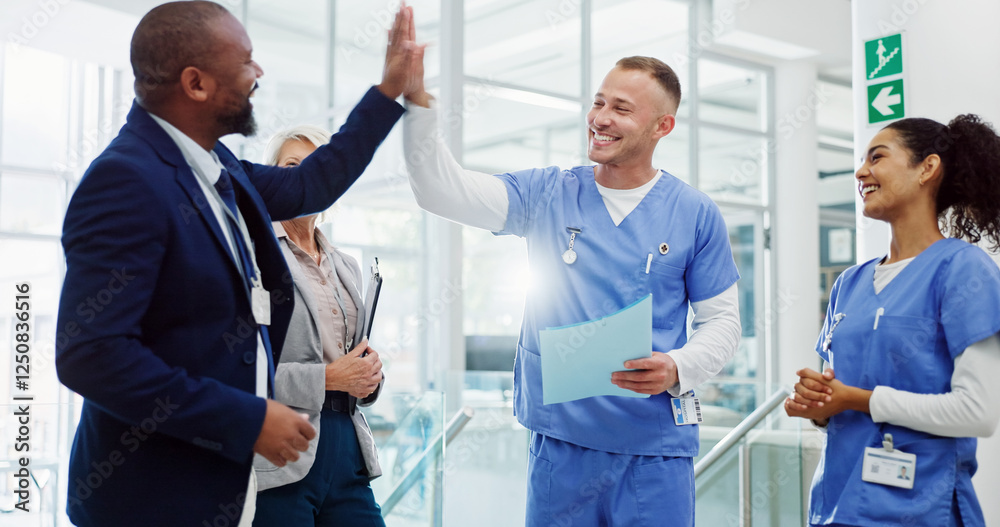 Obraz premium Doctors, high five and celebration with team at hospital for breakthrough, diversity or happy for medical solution. Group, men and women with cheers, success or goal for healthcare services at clinic