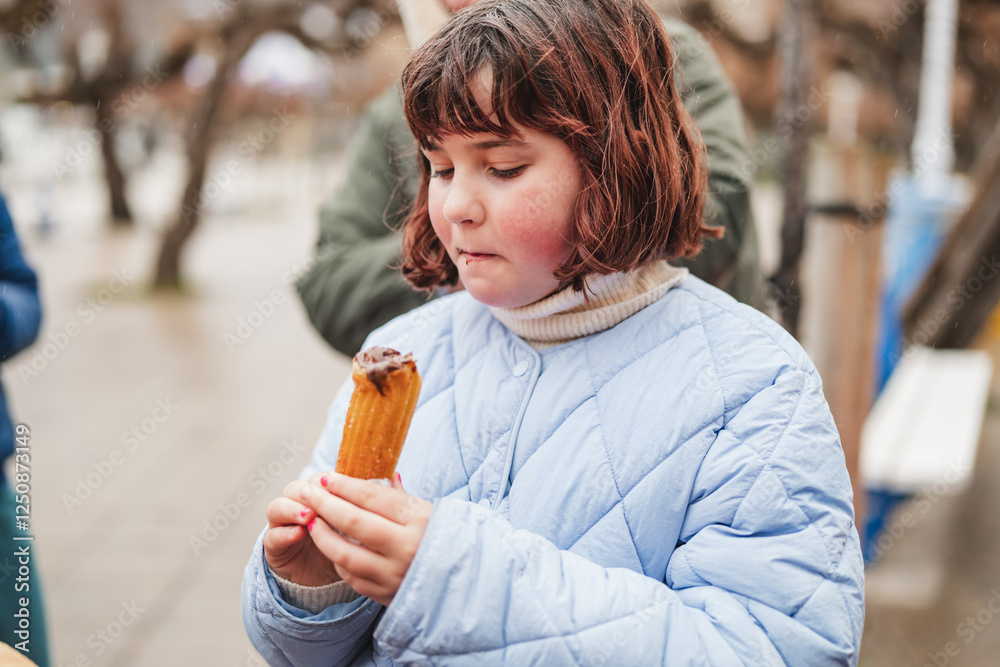 Enjoying delicious fritters in a lively outdoor market while savoring sweet treats on a crisp day Enjoying delicious fritters in a lively outdoor market while savoring sweet treats on a crisp day